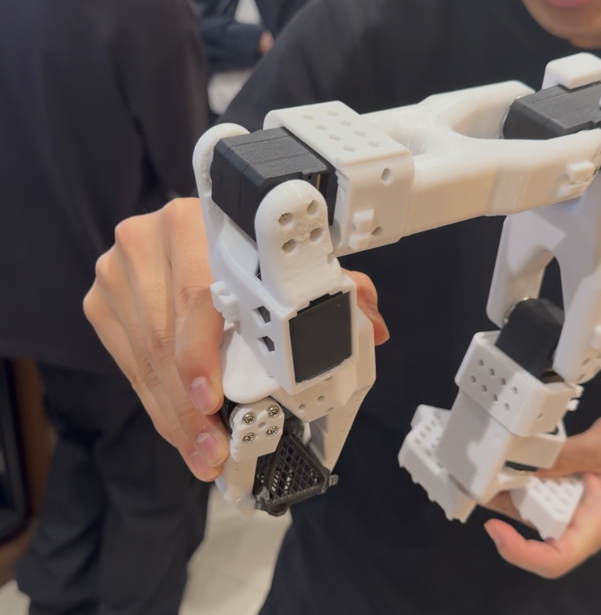 A robotic arm assembling Octet Modules from design data